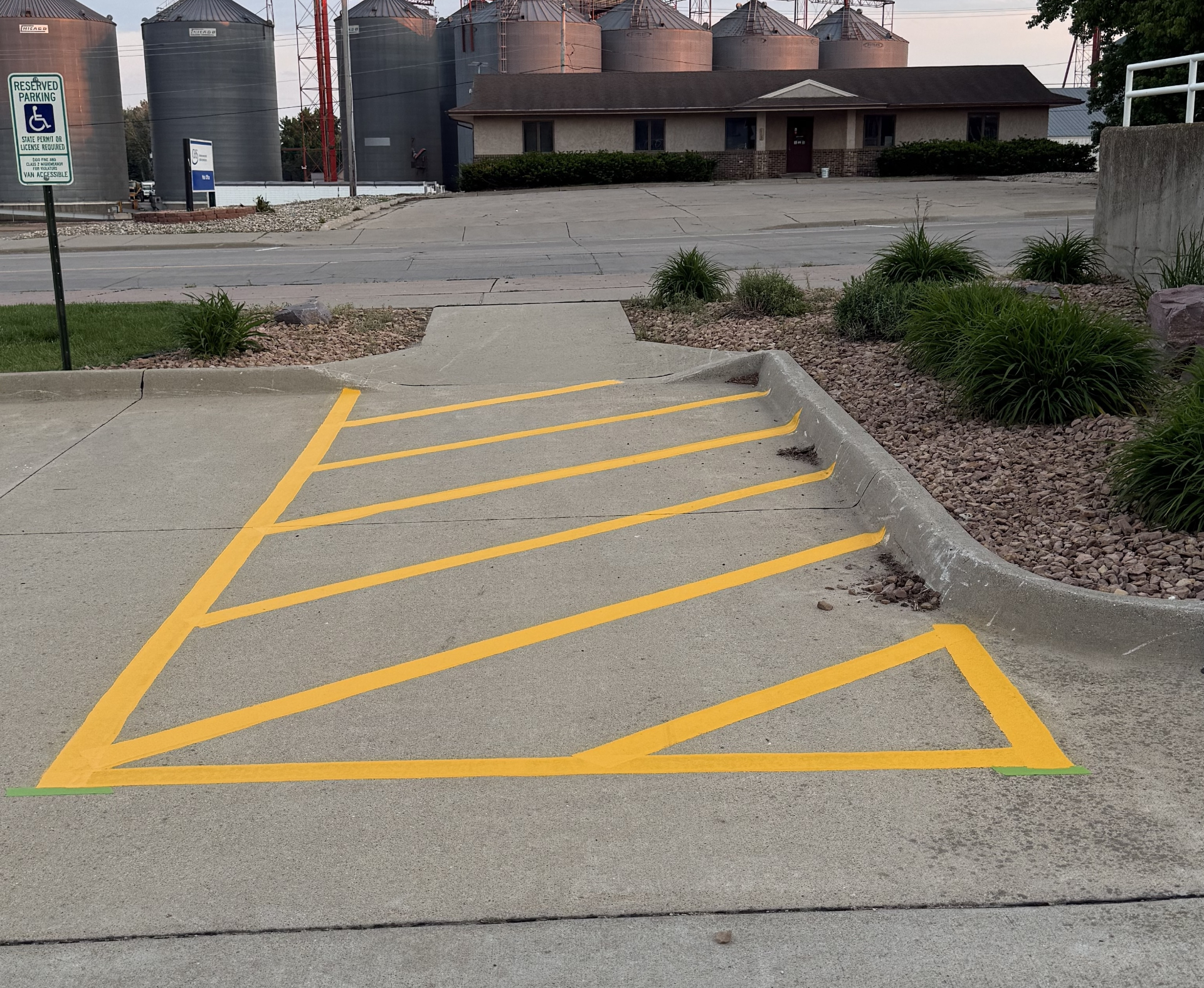 Freshly striped parking lot with crisp yellow lines by Gold Line Striping